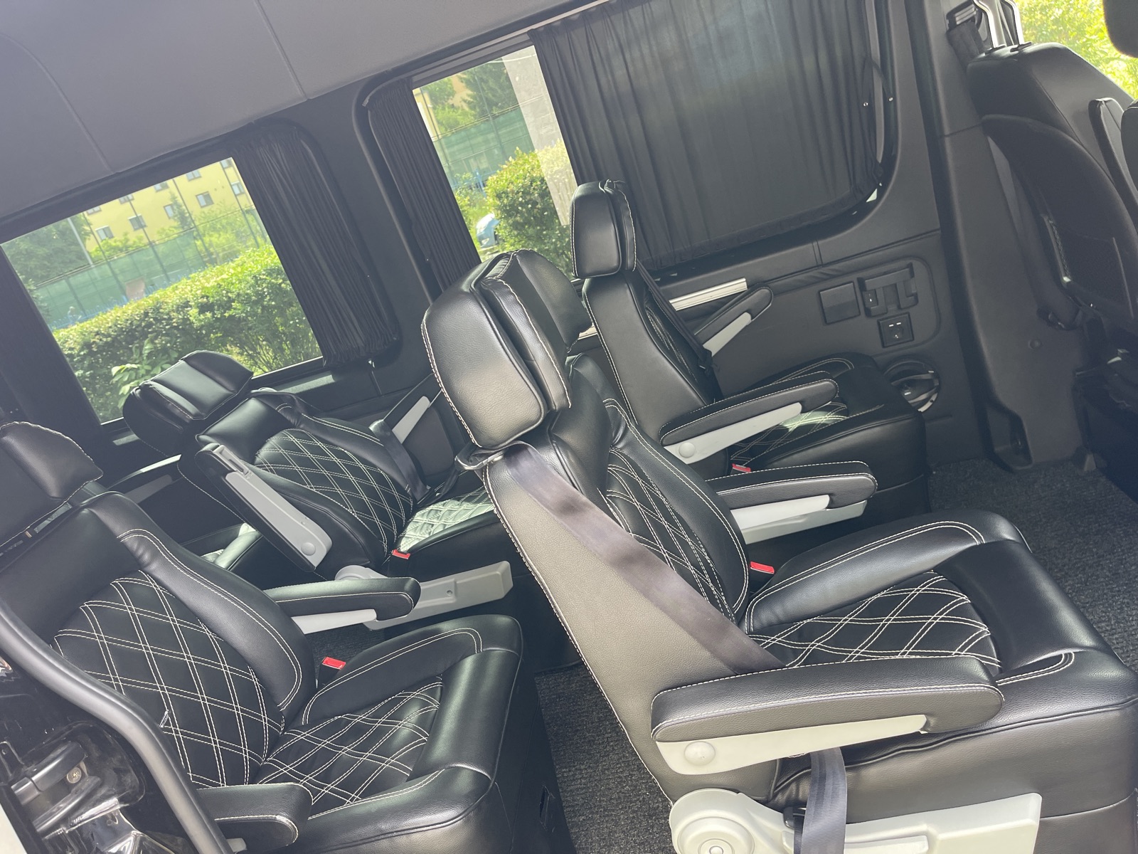 Individual passenger seats inside a minibus